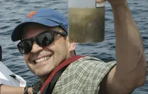 Joe Roman with a sample of whale feces