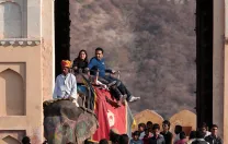 Elephant and <i>mahout</i> at work, at Amber Fort