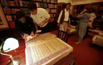 The Chowmahalla's library includes a collection of rare, antique Korans given as gifts to the royal family. (Princess Esra is at right, in blue.)