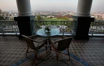 The Falaknuma Palace, another Asaf Jah palace in Hyderabad, looks out over the city. This palace was renovated into India's only seven-star hotel, and is operated by Taj Hotels; Mehrotra's firm consulted on the restoration effort.