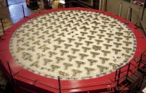 Load-spreading supports affixed to the lower surface will attach the finished mirror to its steel cell, and enable operators to maintain its shape and stiffness.