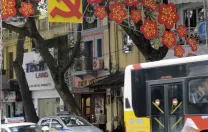 Lest anyone forget, Vietnam remains a Communist Party state, as a street decoration in central Hanoi suggests.