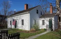 The modest white-clapboard Captain Wilbur Kelly House Transportation Museum