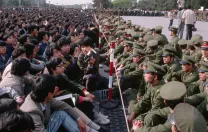 Soldiers block students from the memorial service for Hu Yaobang in the Great Hall of the People, April 22