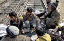 The collectors bide their time between trains.