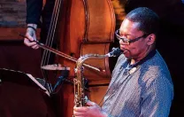 Ravi Coltrane viewed from the top, playing a saxophone