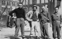 Monuments Men George Stout (at left) and Walter Hancock and Steven Kovalyak flank a fellow soldier in a May 1945 photograph.