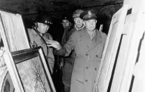 Generals Bradley, Patton, and Eisenhower inspected some of the art stored in the mine complex on April 12.