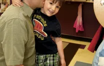 At the Boys &amp; Girls Club, Joshua Coleman drops off his son, Noah.