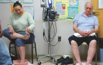 Patients at the BHCHP foot clinic, where other basic services, such as blood-pressure and diabetes checks, are available as well.