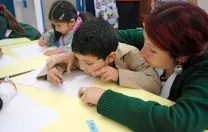 A teacher and student work together on a writing exercise. Chilean schools typically don't begin to teach reading until the first grade; UBC gives teachers strategies for introducing the alphabet and building early literacy with four- and five-year-olds.