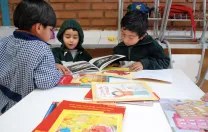 UBC focuses on classroom design and organization as well as lesson content. The program teaches that something as simple as keeping books readily accessible to children, rather than locked away in a cupboard, encourages early engagement with reading.