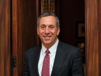 Portrait photograph of Harvard president Lawrence S. Bacow