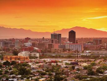 Photograph of the Tucson, Arizona, skyline and downtown taken at sunset.