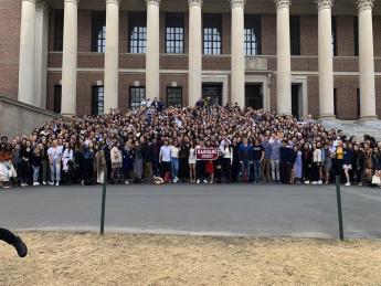 An impromptu senior class photo on the steps of Widener Library
