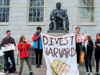 The author and fellow activists at a Divest Harvard rally this past April: (from left) Caleb Schwartz ’20, Flores-Jones, Anand Bradley ’19, Owen Torrey ’21, Eva Rosenfeld ’21, and Sophia Higgins ’21