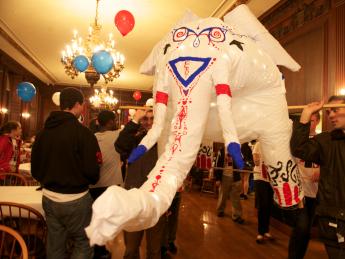 Students prepare the Eliot House elephant to appear in the 375th anniversary parade.