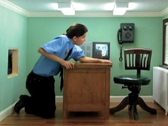 A scene from Meredith James’s video <i>Day Shift </i>, starring James herself