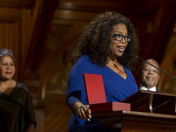 Oprah Winfrey accepts the W.E.B Du Bois Medal for the late writer and activist Maya Angelou.