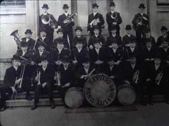 An early group photo of Band members wearing bowler hats