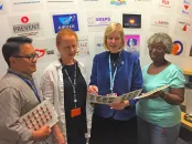 JoAnn Manson (center, in blue) meeting with research staff 