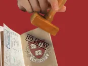  passport with a Harvard shield being stamped "No entry" 