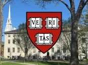 FAS shield in the foreground with University Hall in the background