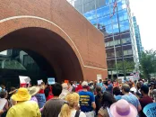 protesters gather outside of Moakley courthouse