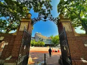 View of Harvard Science Center through a gate