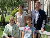 Harvard students Olivia Zheng, Richard Rodgers, Eli Johnson-Visio, Julia Grinstead, pose outside near Harvard University