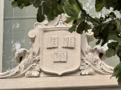 Veritas insignia etched in stone