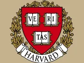 Harvard University crest featuring a shield with books and the words "VERITAS" and "HARVARD".