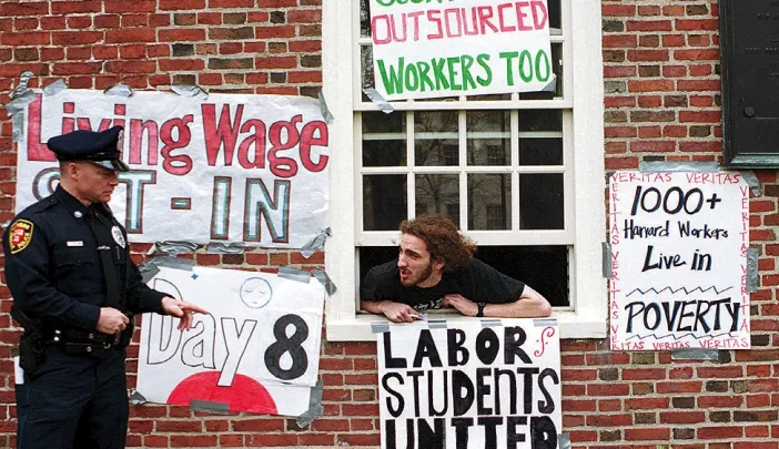 Student protestor and Harvard police officer during the Mass Hall living-wage protest, April 25, 2001
