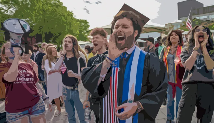 A jubilant graduate shouts into a megaphone, surrounded by a cheering crowd.