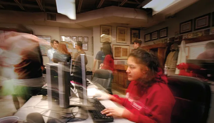 Late at night, Harvard Crimson staffers put to bed the last issue before winter break.