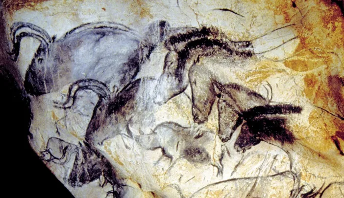 The human urge to create art appears magnificently in the Paleolithic paintings from roughly 30,000 years ago at Chauvet Cave, in southern France. Here, the Panel of the Horses.