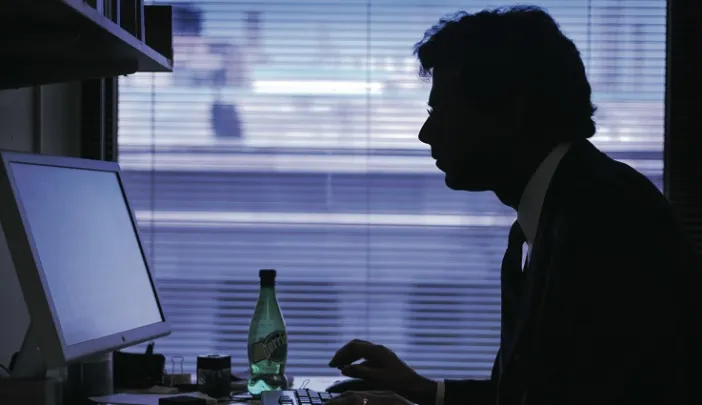 Gawande in his various environments: in his office at the Harvard School of Public Health