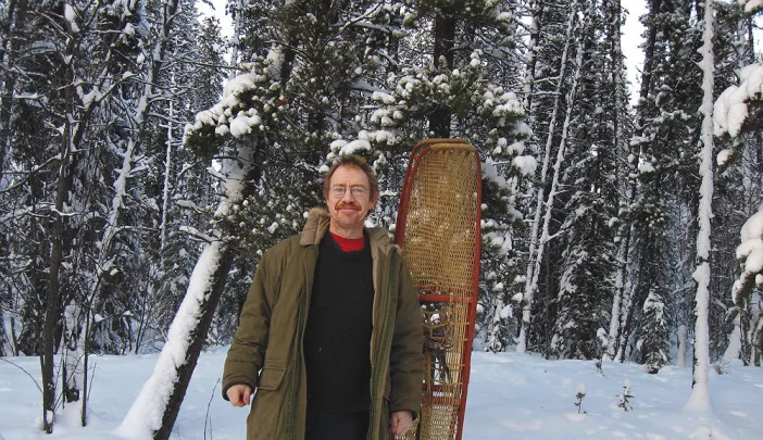 Photograph of Eric Hegsted in Yukon snow with snowshoes