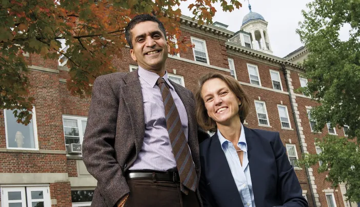 Rakesh and Stephanie Khurana of Cabot House, in front of their domain 