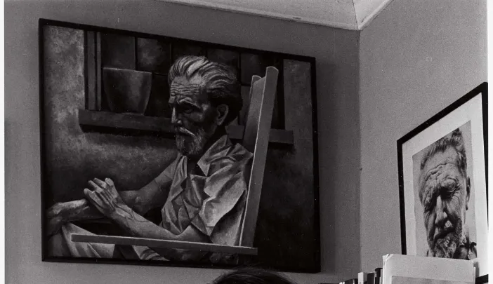 Davenport at home in 1975, with two of his own works behind him. An image of Ezra Pound by Richard Avedon partners Davenport’s portrait.