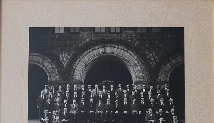 Formal portrait of the Board of Editors for volume 70 of the “Harvard Law Review” (1956-1957), photographed on the steps of Austin Hall. The author, only the third woman admitted to Review membership, stands in the fourth row, at upper left.