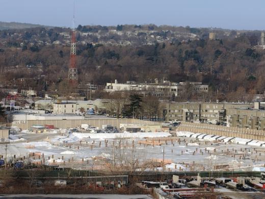 Construction of the Allston science complex will halt. The Charlesview housing site, across Western Avenue (to the right), will come under Harvard’s control—but development of a proposed arts and cultural hub at this key intersection with North Harvard Street remains a vision for the future.