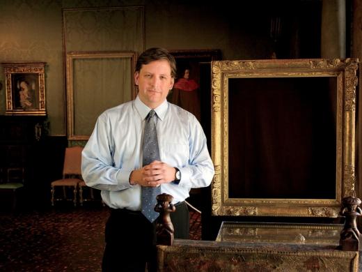 Anthony Amore at the Isabella Stewart Gardner Museum in Boston, with empty frames that held venerable paintings before the 1990 theft