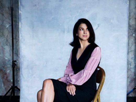 Vanity Fair editor-in-chief Radhika Jones poses stylishly in a studio 