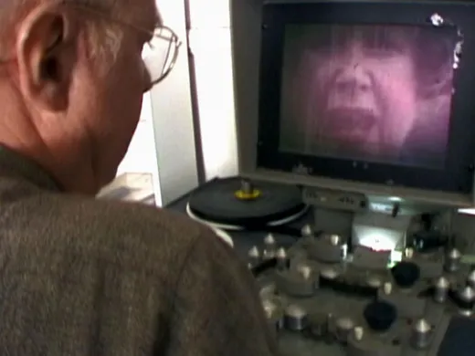 A still from Olch’s film shows Richard Rogers at his editing console, watching footage of his mother