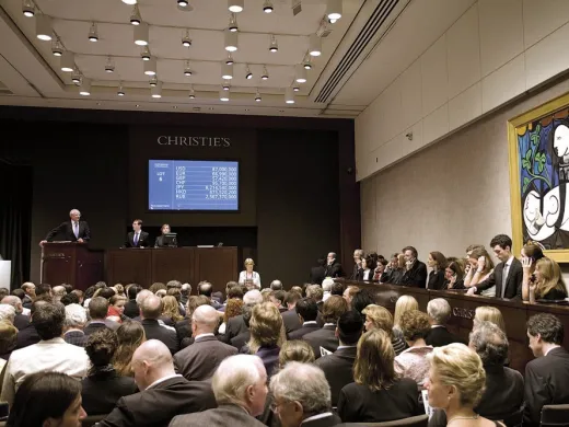 The 1931 Picasso painting <i>Nude, Green Leaves and Bust</i> being auctioned at Christie’s in 2010. The sale price of $106 million set a world record.