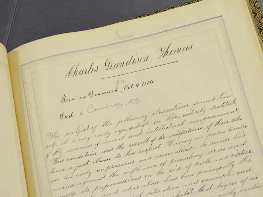 Photograph by Harvard Magazine/JC The beginning of Thomas’s entry in the Class of 1838’s Class Book (Harvard University Archives, HUD 238.714)