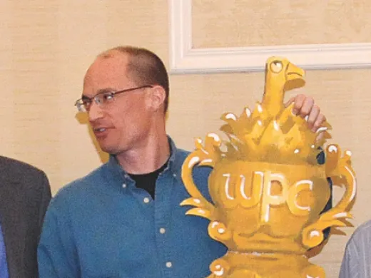 Mark Saltveit displays for the first (and last?) time the World Palindrome Championship trophy.