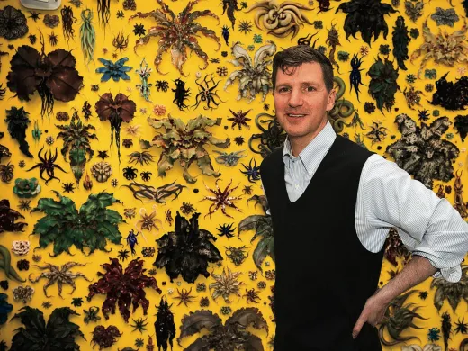 Adams in front of his 2015 installation, <i>Life, or Something Like It.</i>