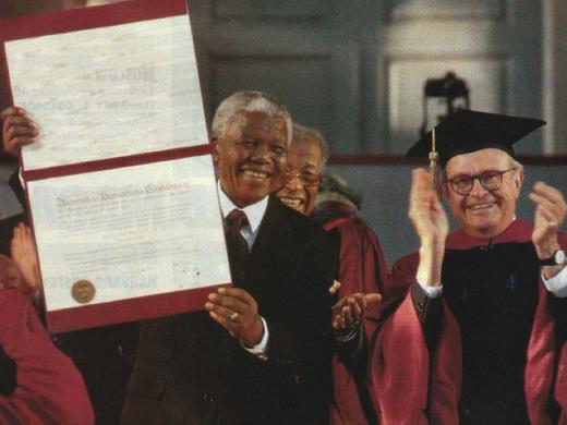Photograph of Nelson Mandela receiving honorary degree and University Marshal Rick Hunt